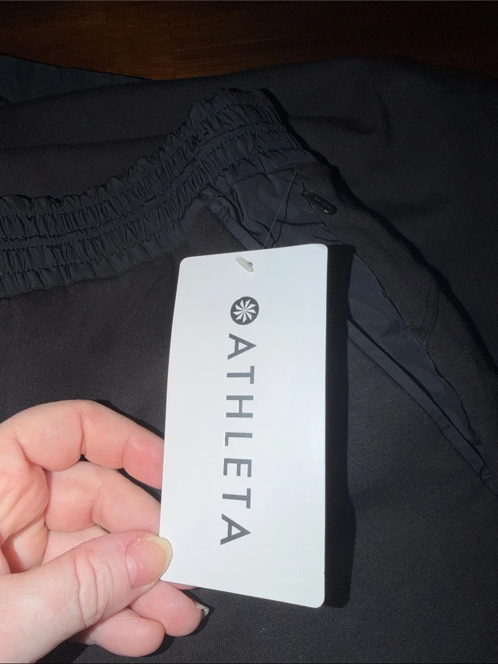 Athleta Ladies NWT Triumph Hybrid Wide Leg Cropped Pants. Large. Black.